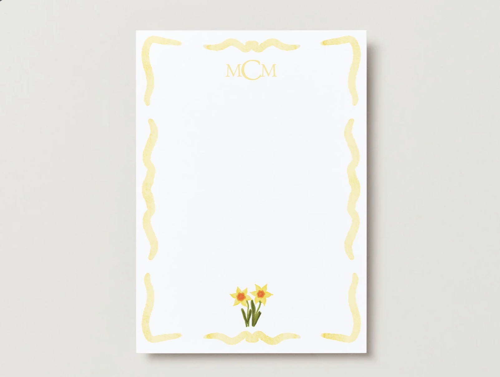 Daffodil birth flower A7 flat card with a yellow scalloped watercolor border on a pale gray background